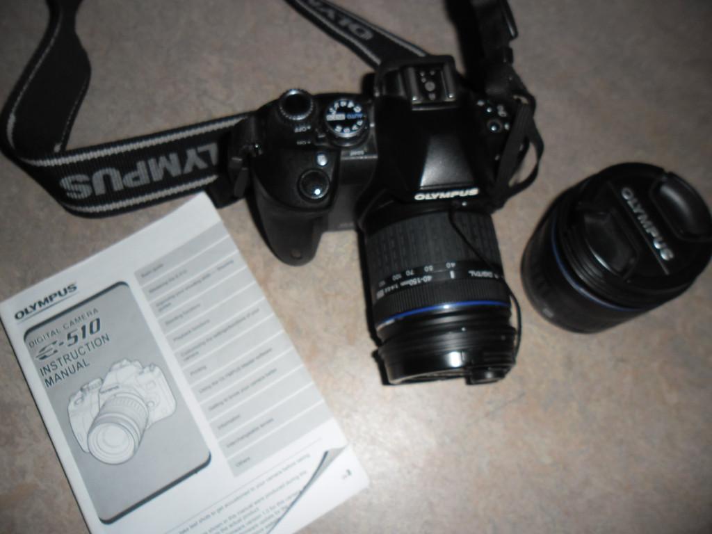 Olympus E-510, Spiegelreflexkamera + viel Zubehör in Aesch - Bild 2