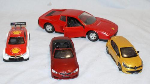 4 Modellautos Ferrari Testarossa BMW M3 Clio BMW M4 in Bremgarten - Bild 1