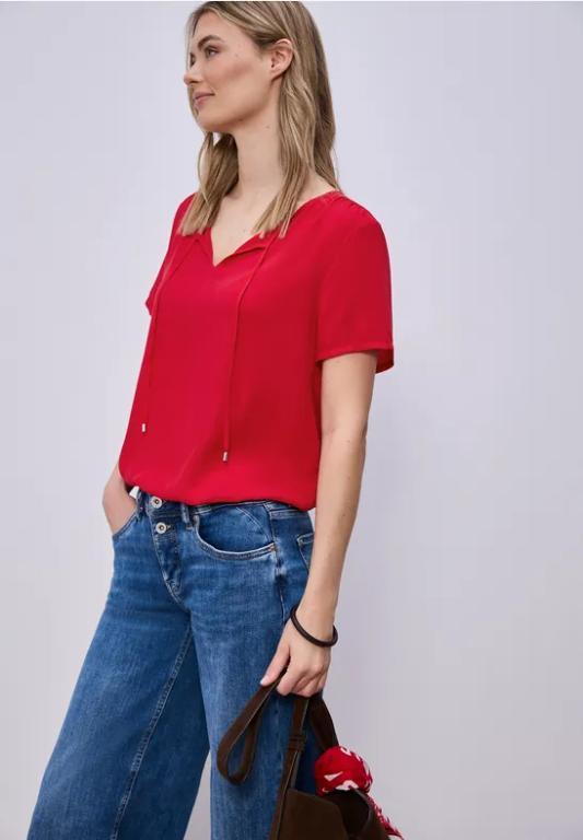 Kurzarm Bluse mit String-Detail in der Schweiz - Bild 1